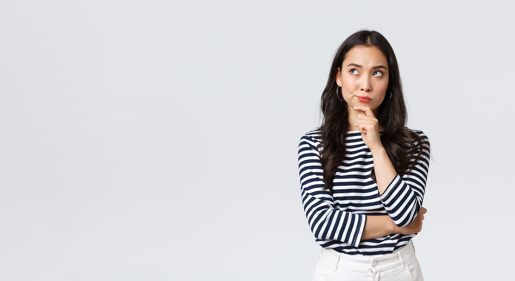 Young woman pondering something