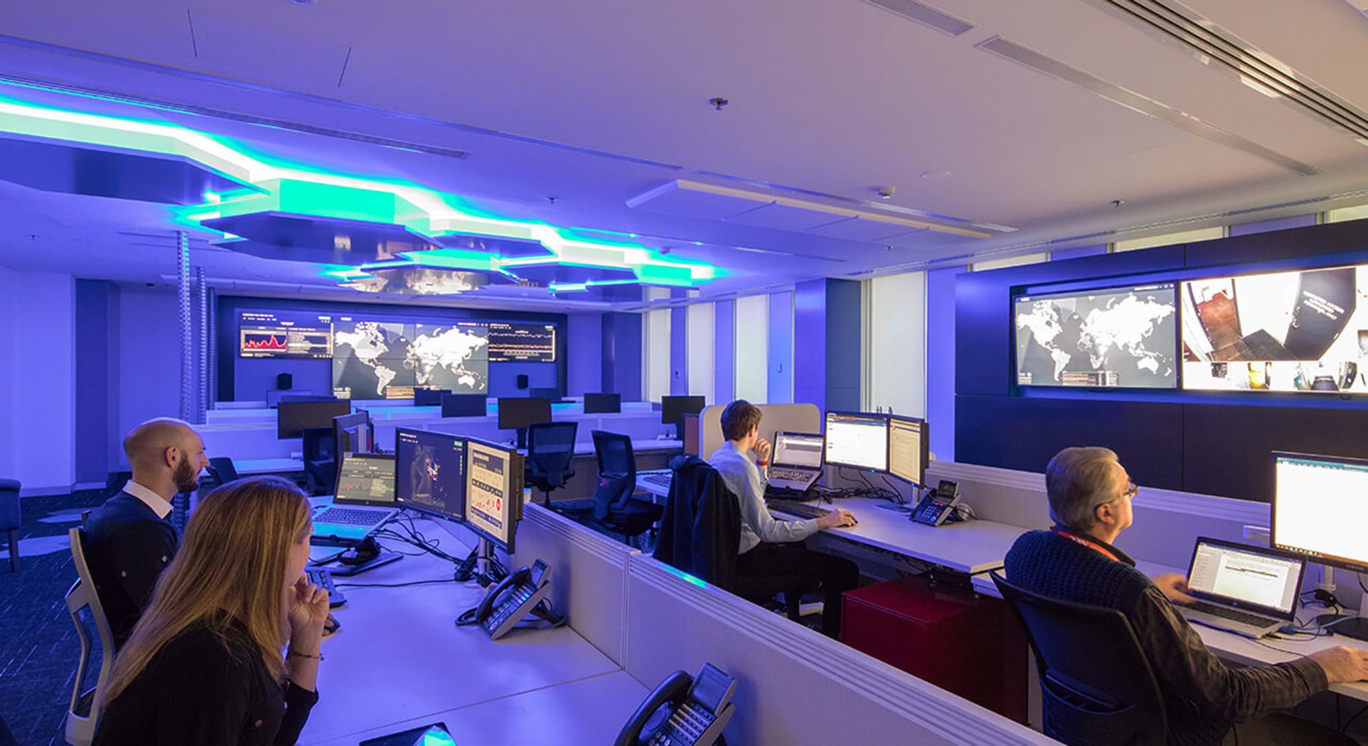 A security centre with analysts looking at their screens