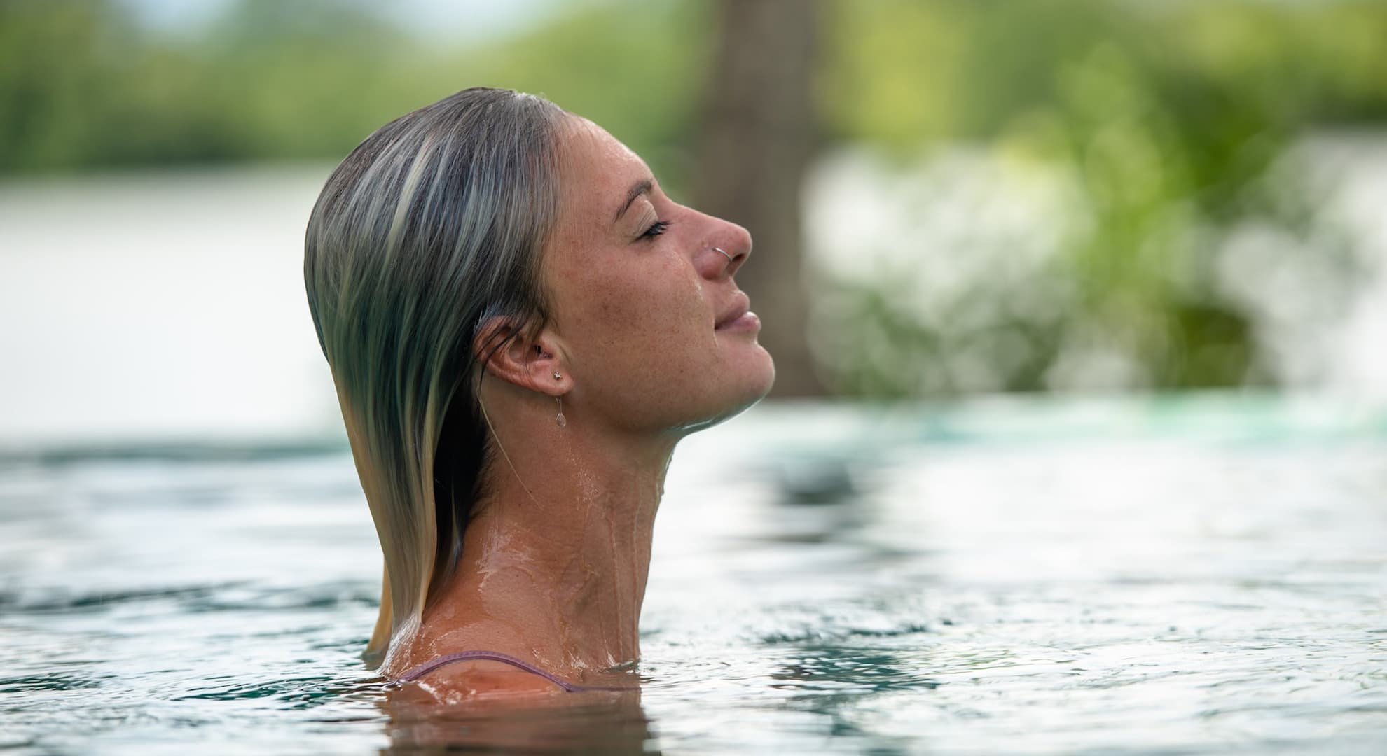 Woman swimming in a pool.