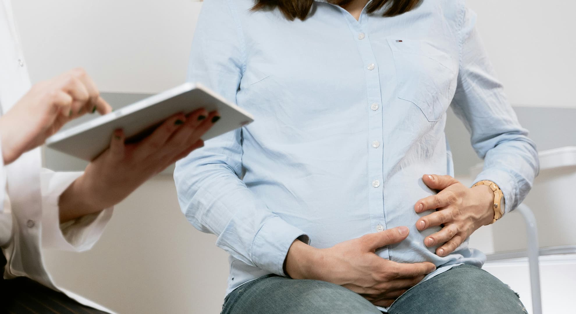 Midwife with pregnant patient