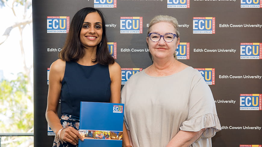 Maxveen Kaur Sandhu poses with Catherine Barratt holding her certificate.