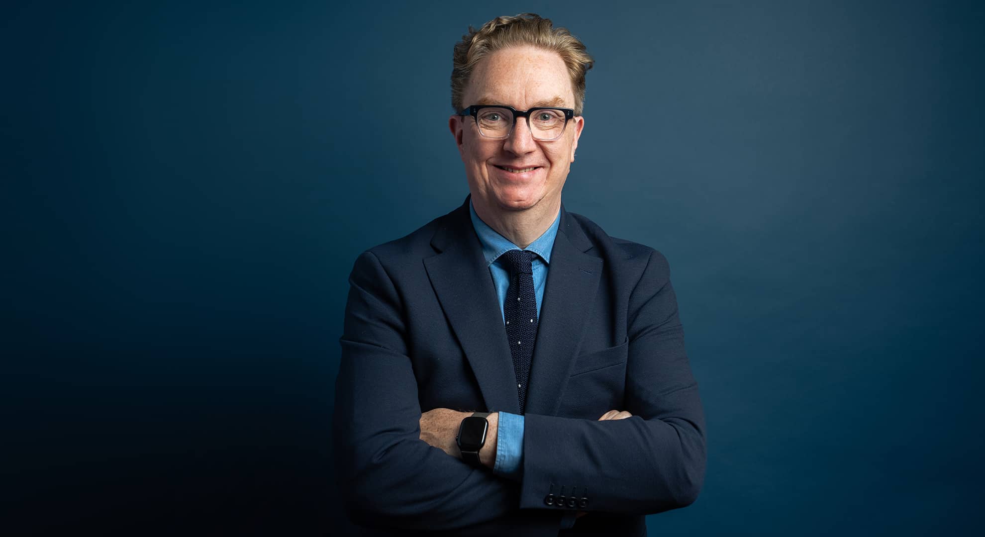 Colm Harmon smiling at camera