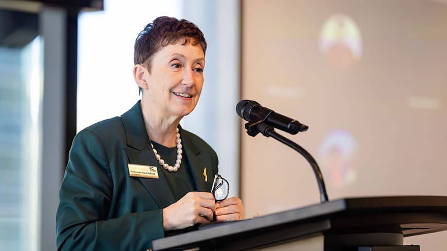 Woman speaking at event