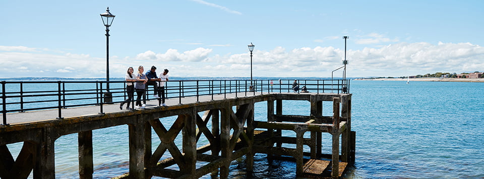 University of Portsmouth students on pier at Southsea beach