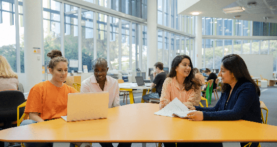Students sitting in library
