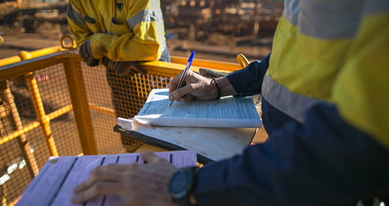 mine worker with document