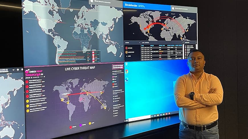 Dr Mohi Ahmed stands inside Security Operations Centre.