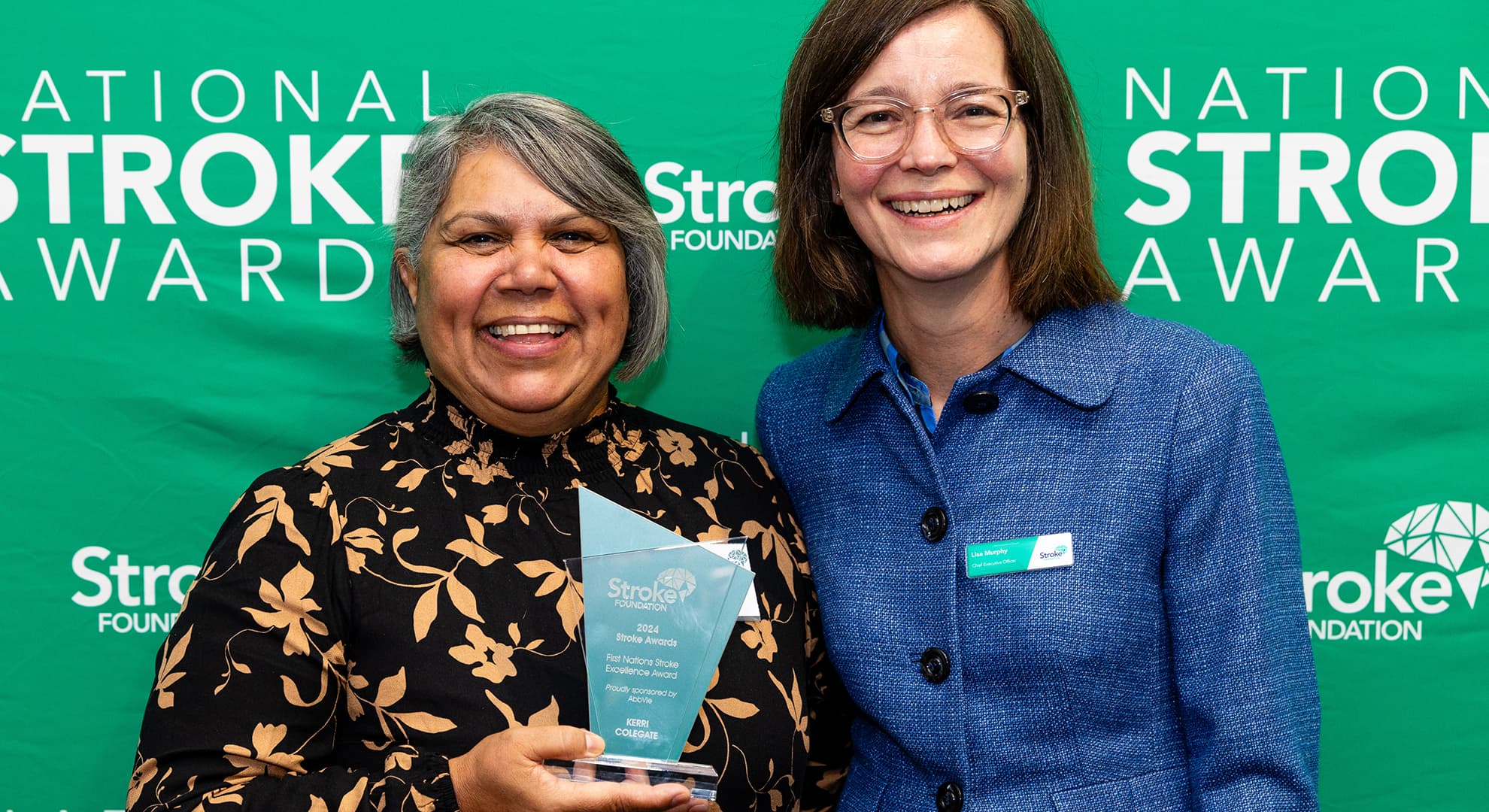 Kerri Colegate holds her First Nations Stroke Excellence Award with the CEO of the Stroke Foundation, Lisa Murphy.