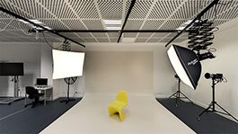 Photography studio with backdrop and flash hoods