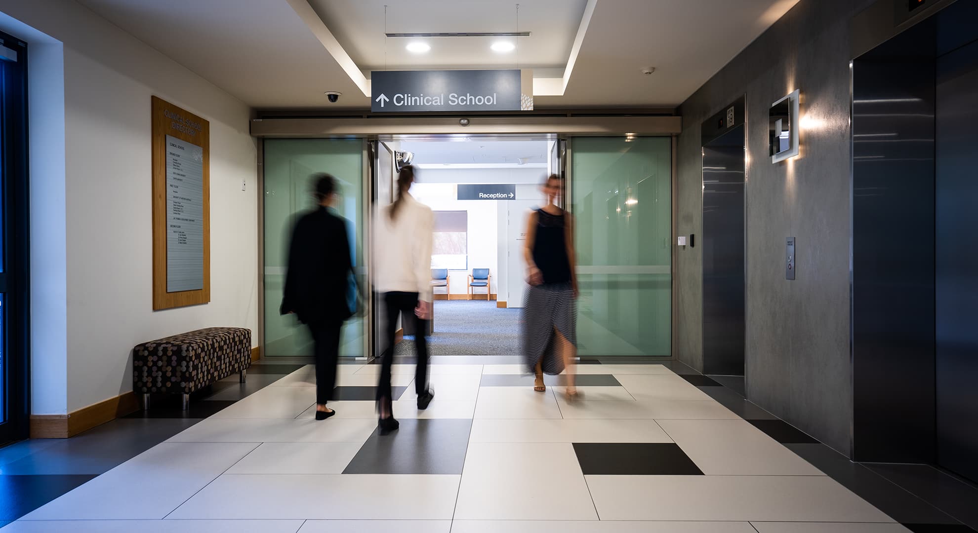 Three women at the entrance to a clinical facility in Joondalup.