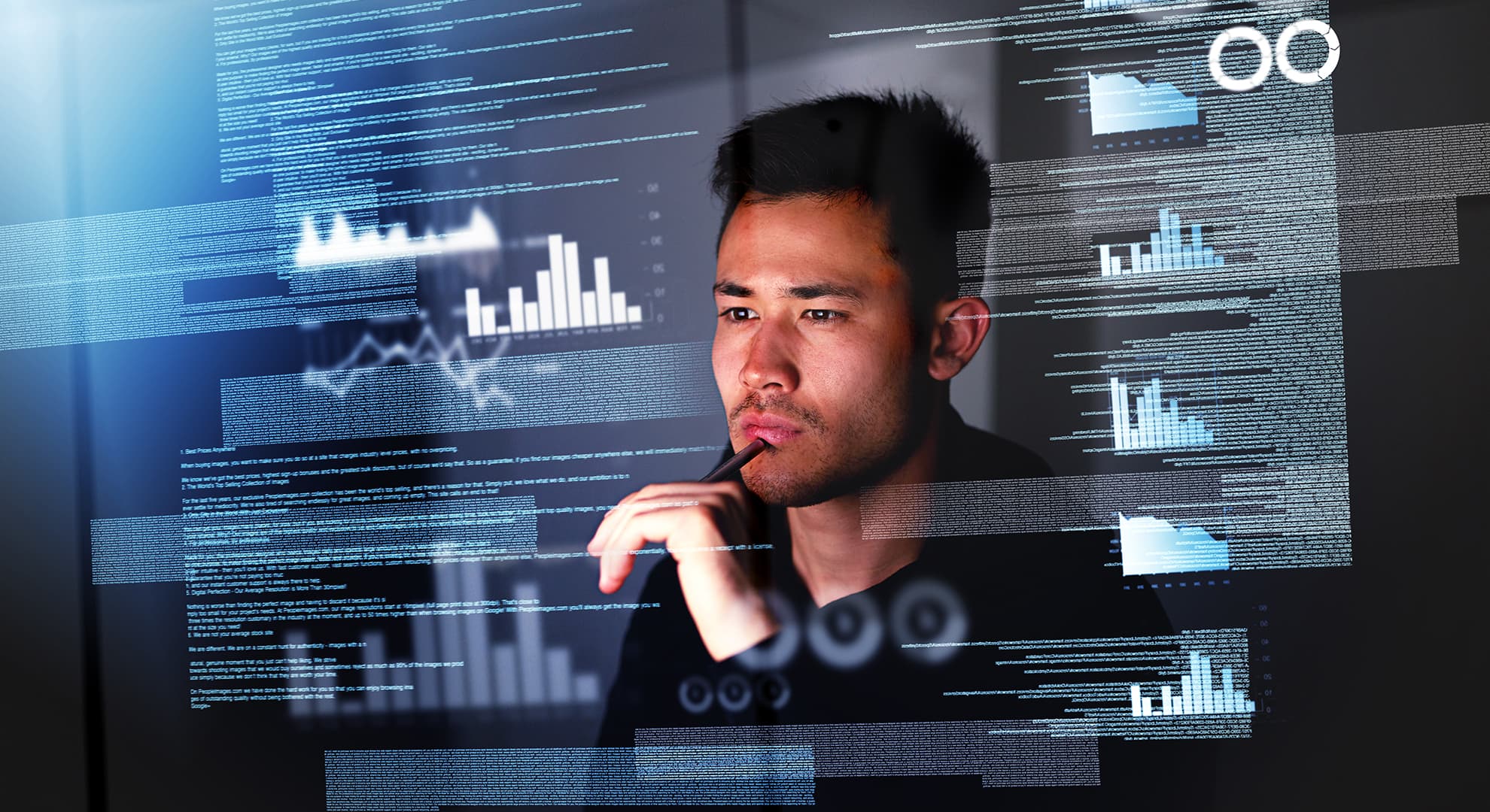 Young man looking at a computer screen