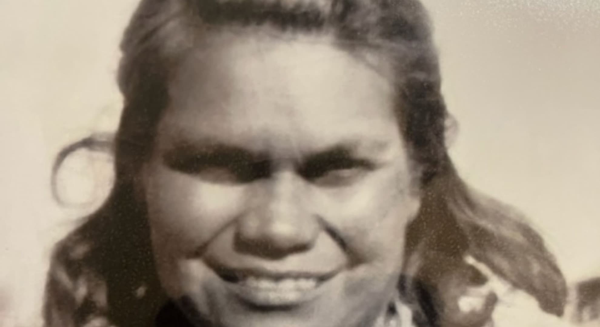 Black and white photograph full face of young Aboriginal woman