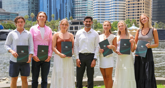 Group of students who participated in the study abroad program plus holding their certificates on elizabth quay