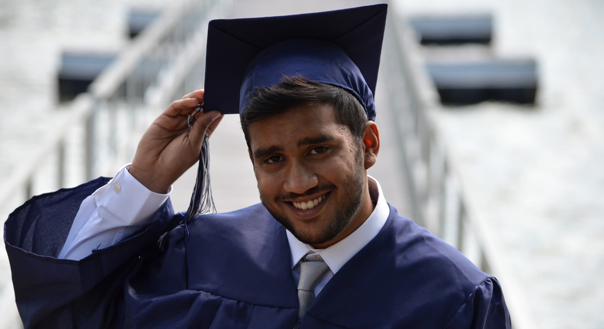 Indian university student in graduation regalia
