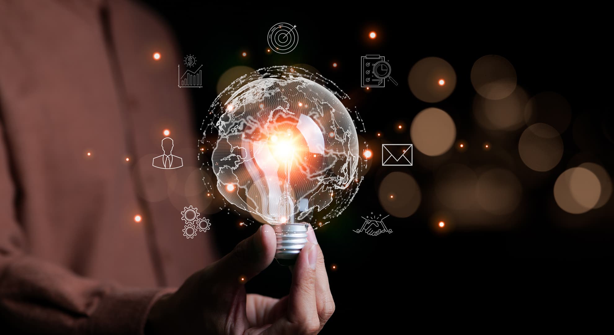 Man holding a lightbulb switching on