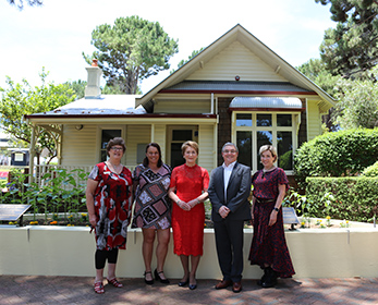 Group photo in front of Edith Cowan House