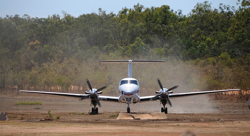 aeroplane landing in outback