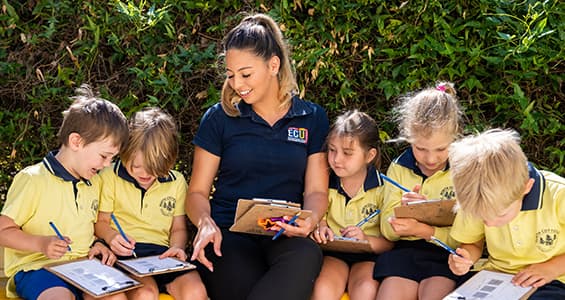 Teacher reading to students