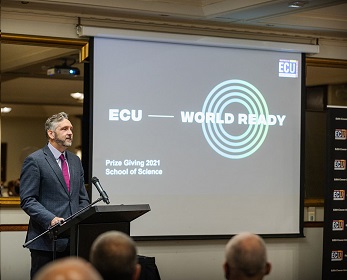 Professor Andrew Woodward announcing the prizes.