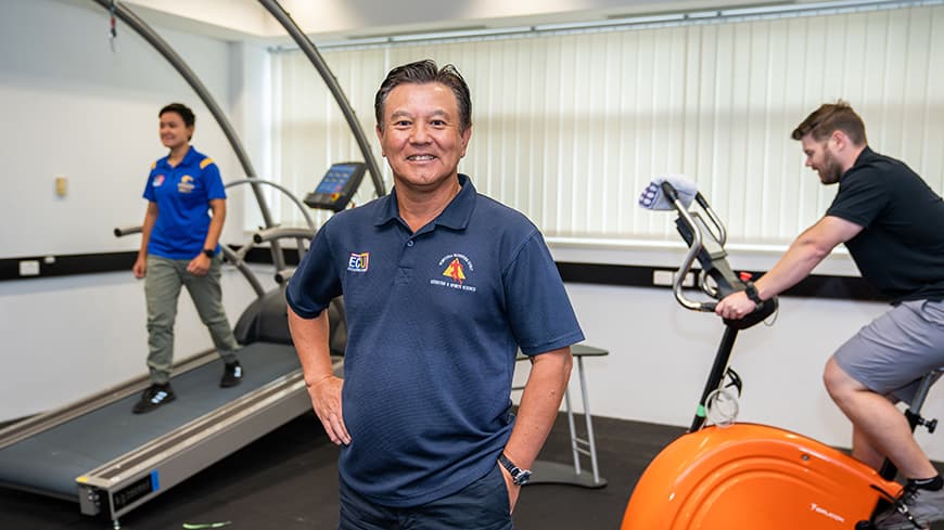 Professor Ken Nosaka in a gym.