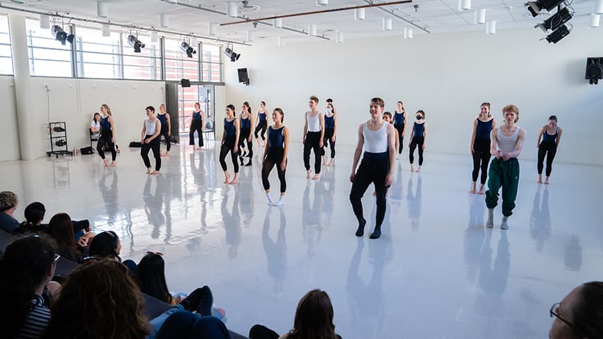 Young dance students performing for an audience