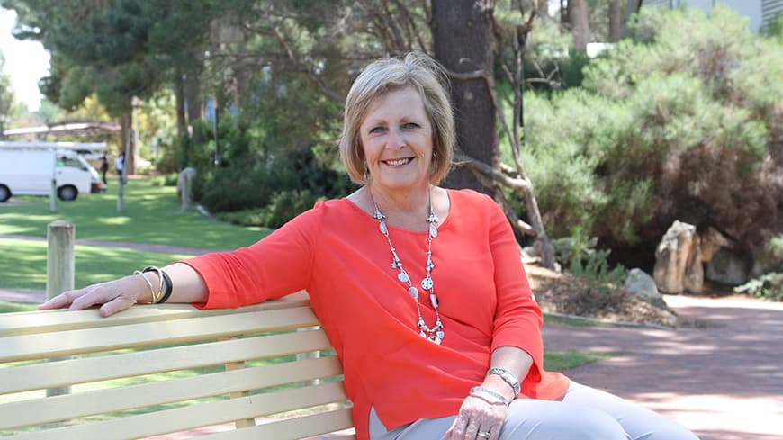 Professor Beth Armstrong sitting outside ECU South West campus
