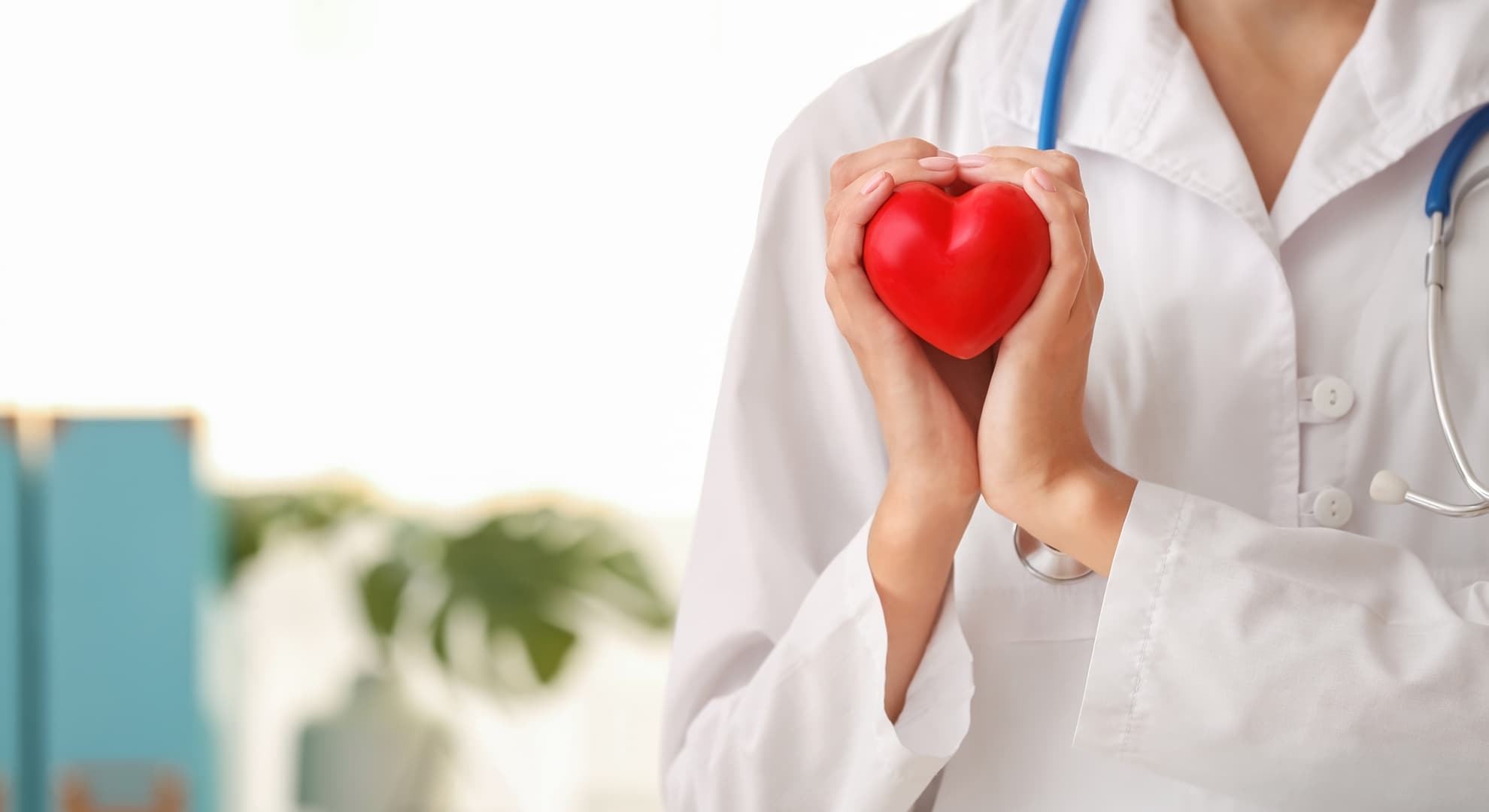 Doctor holding a heart symbol