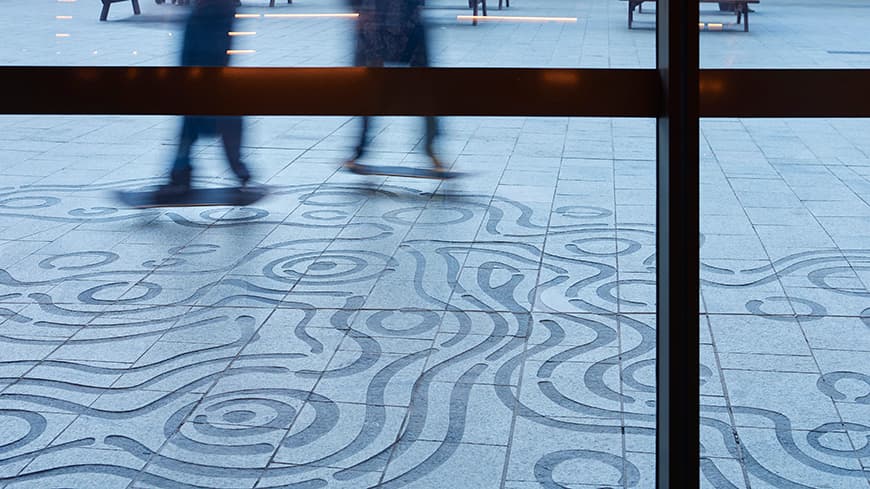 Circular artwork engraved in a pavement