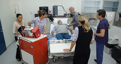 Image shows a scenario displaying leadership and teamwork in medical emergency teams