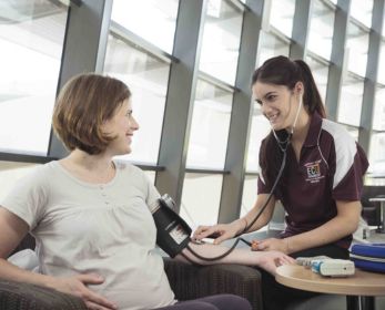 Student Midwife and Expectant Mother