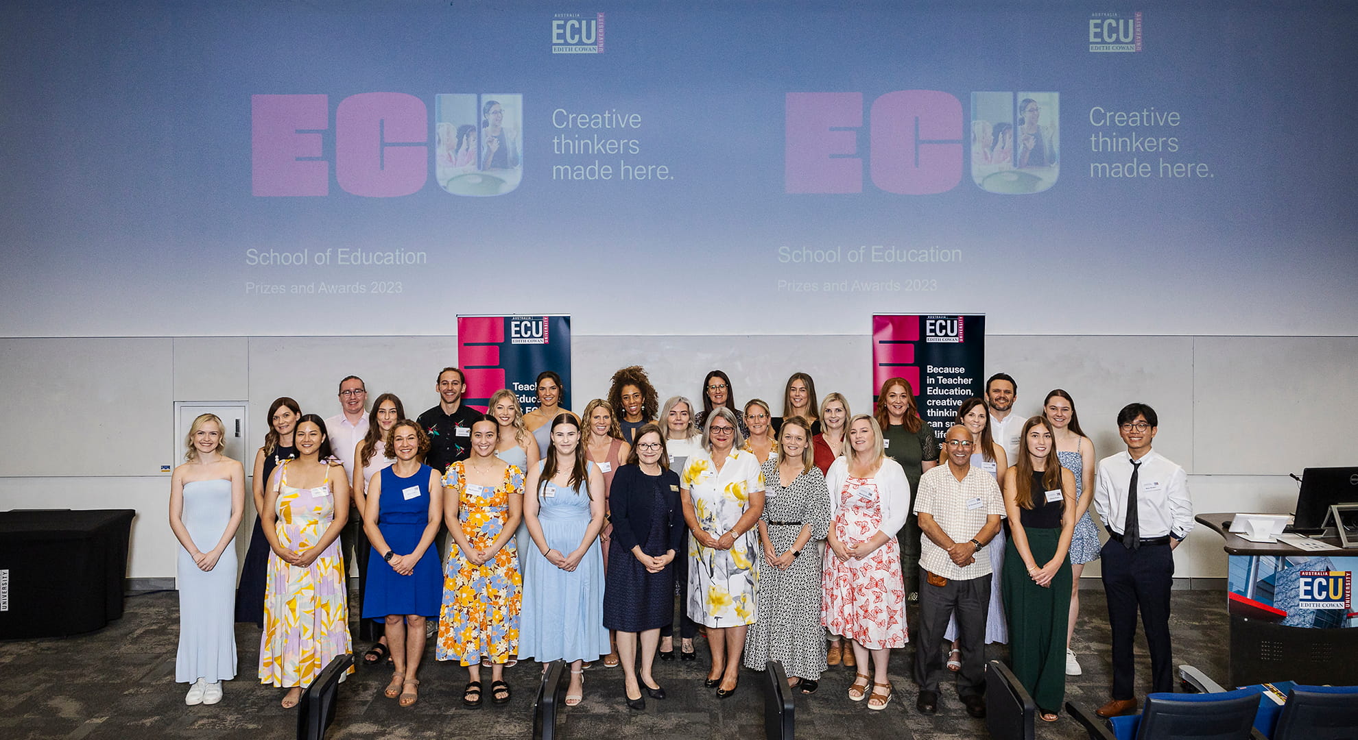 ECU School of Education students and Professor Caroline Mansfield stand in a group at the Prize Giving Ceremony.