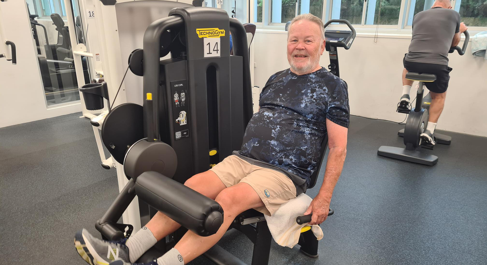Man exercising in a medical clinic.