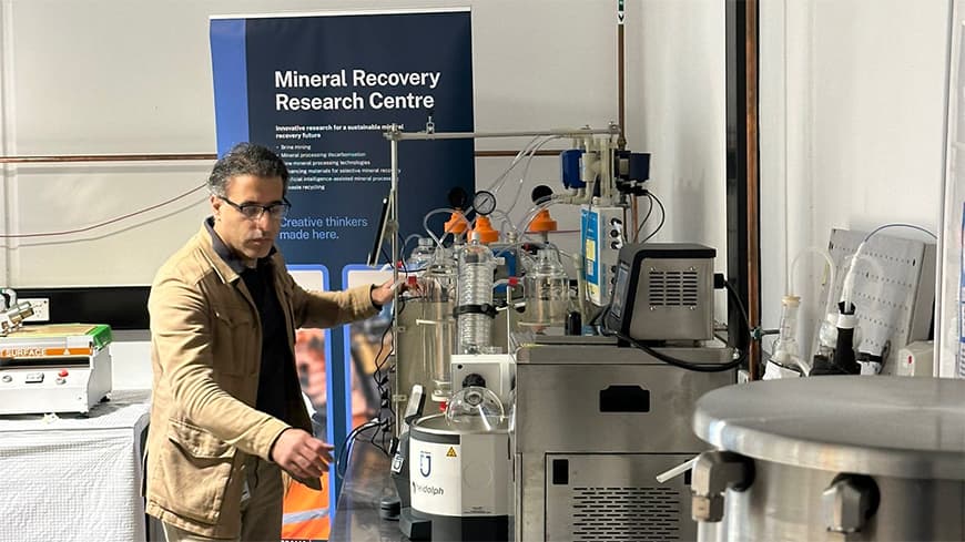 Man working in a lab with machinery