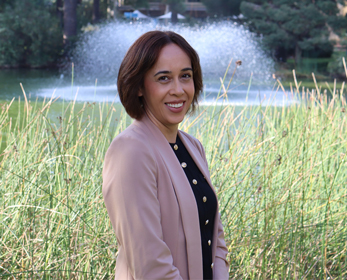 A portrait image of Miss Megan Warren in front of the ECU Joondalup Lake