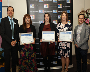 3 winners of the Athena sWNA Advancement Scheme Awards standing wiht two Pnael selection members