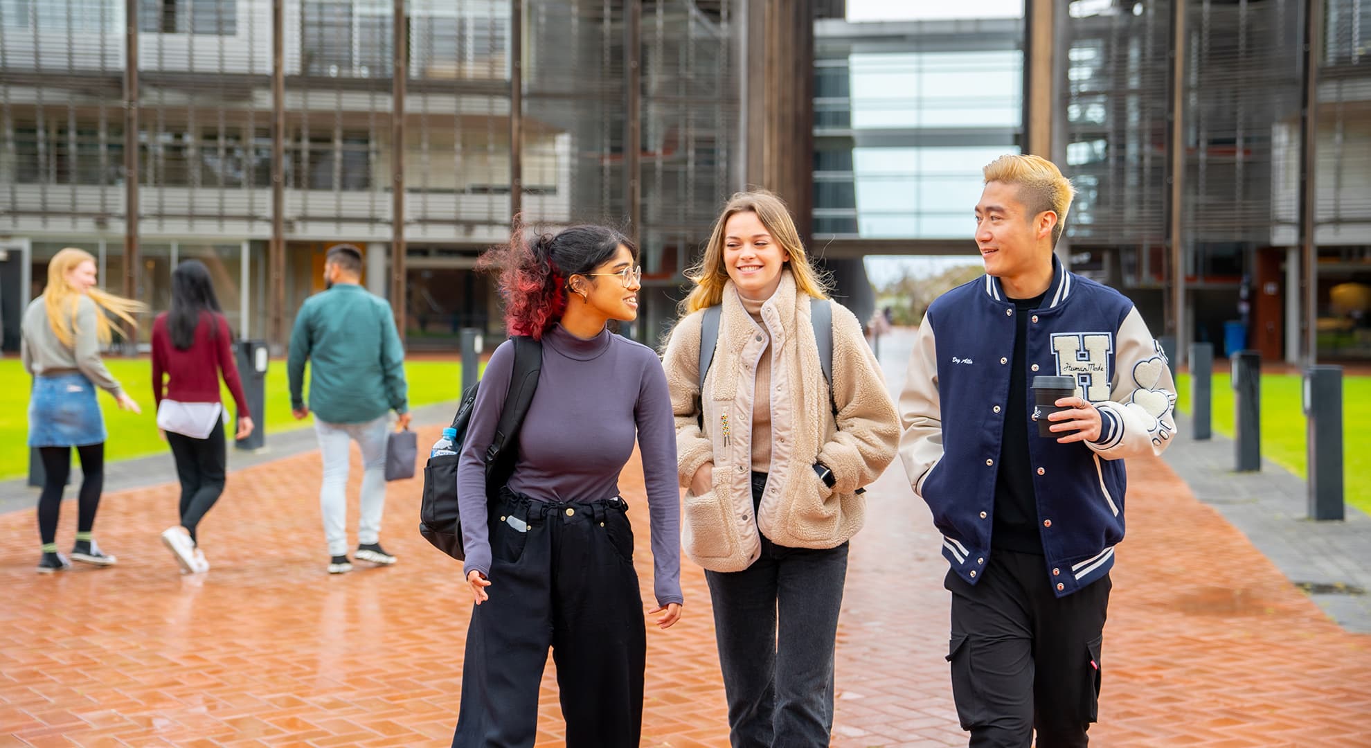 group of student walking on campus