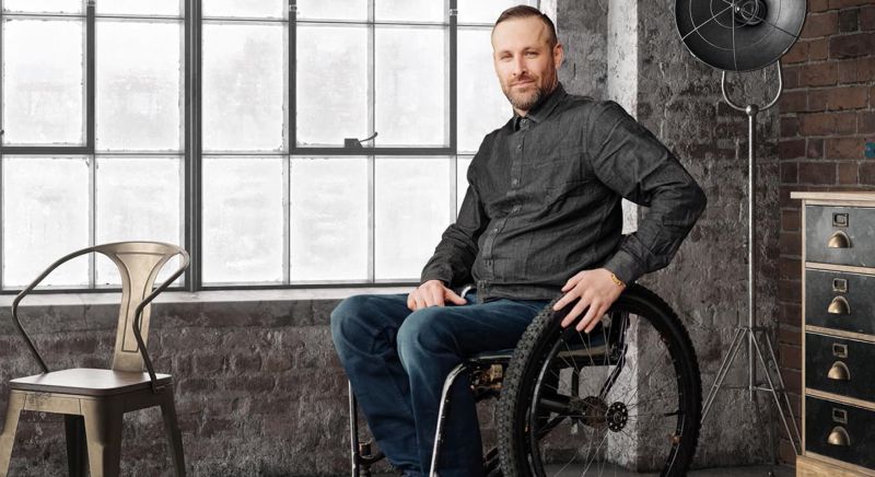 A disabled man sitting in his wheelchair