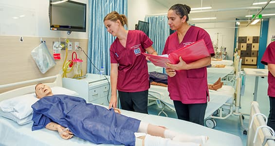 Two nurse students in practice ward