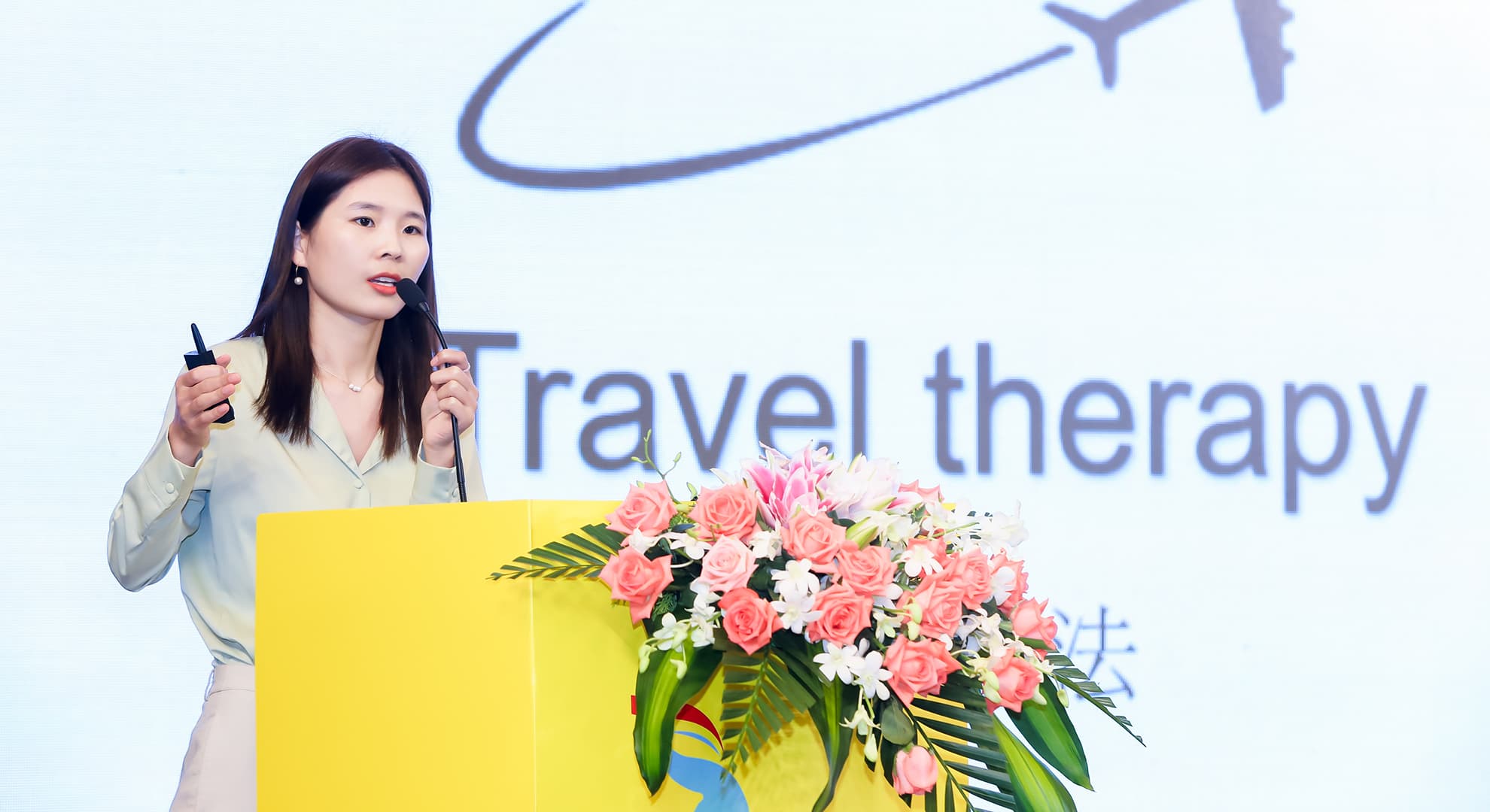 Fangli Hu presenting at the 2023 Guangzhou International Travel Fair.