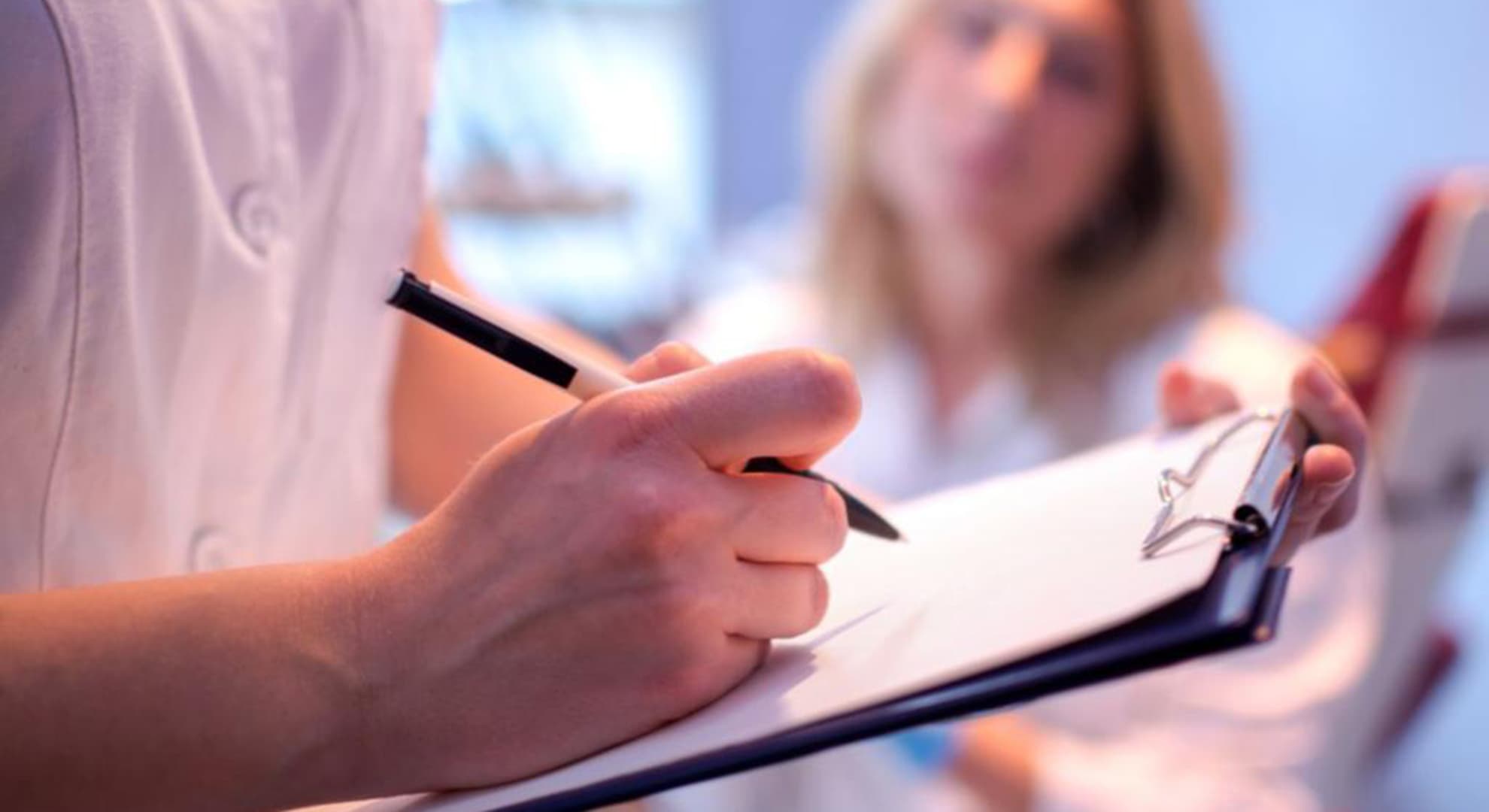 Doctor holding a medical folder