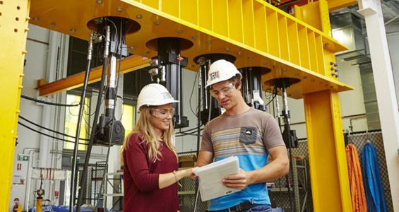 Two engineering students on site.