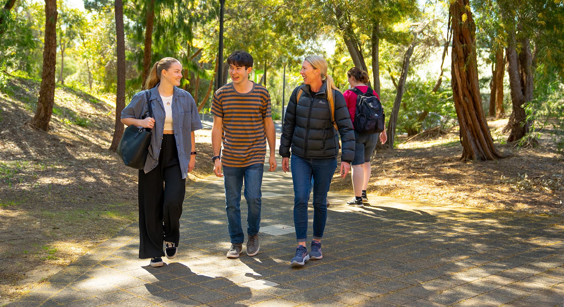 Students walk around the ECU South West campus.