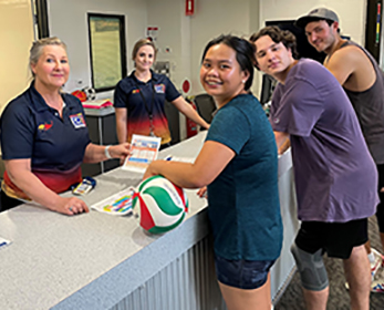 ECU Sport and fitness members are assisted by reception staff at the front counter
