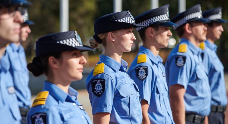 Police recruits standing in a line.