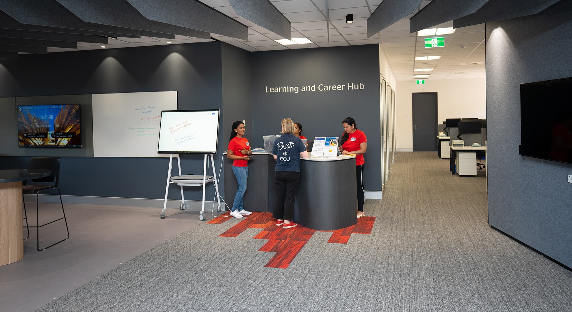 Staff and students talking in the Joondalup Campus Career Hub.