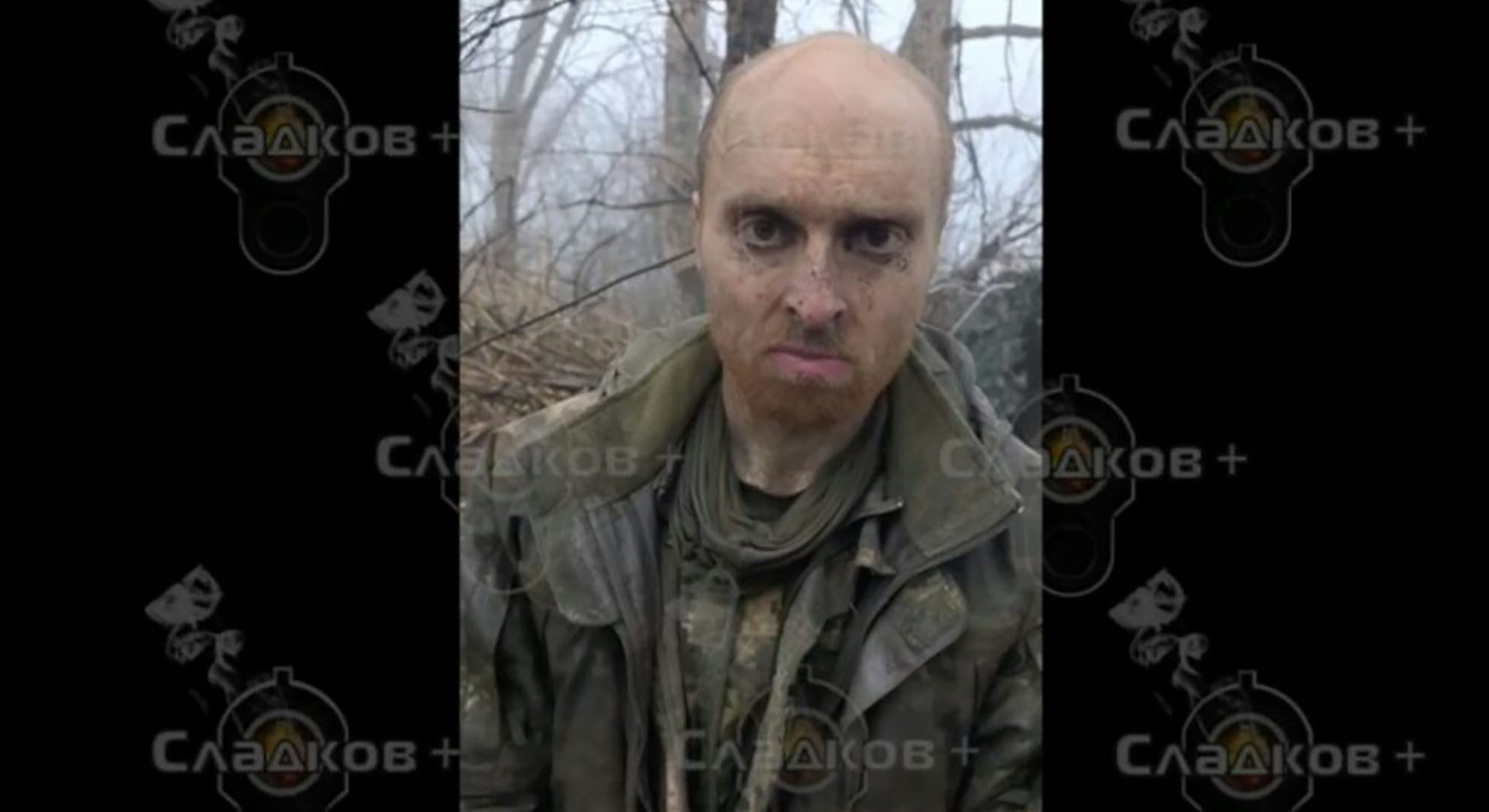 Dirty and dishelved man staring into the camera.
