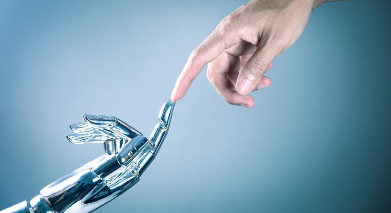 Human and robot hand connecting