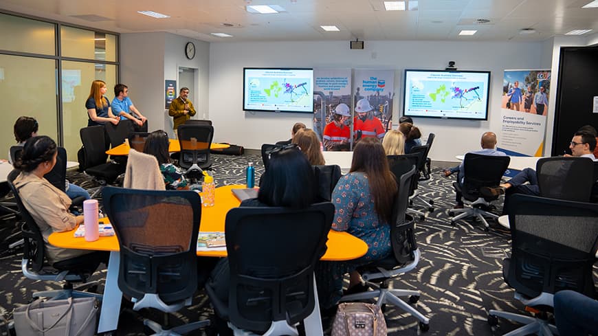 People in a campus conference room attending a Careers event.