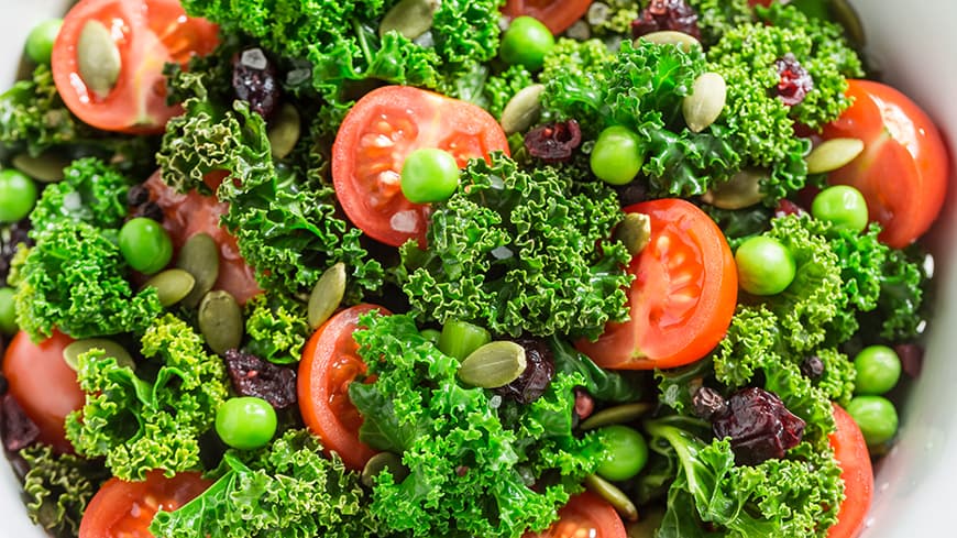 Bowl of kale and tomato salad