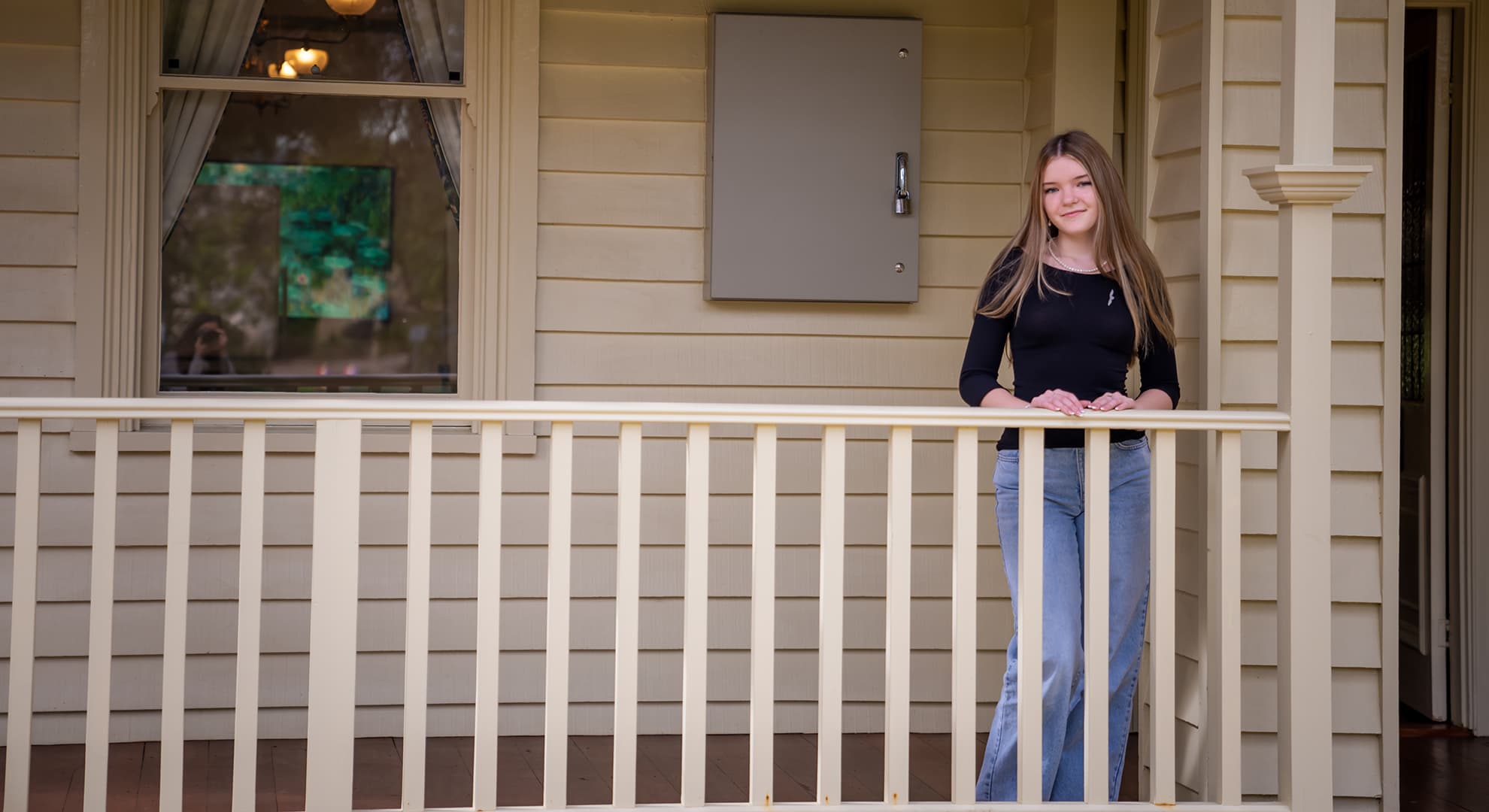 Year 12 student Ayla Lewkowski stands in front of Edith Cowan House.